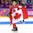 SOCHI, RUSSIA - FEBRUARY 21: Canada's Haley Wickenheiser #22 skates with the Canadian flag after receiving her gold medal at the Sochi 2014 Olympic Winter Games. (Photo by Andre Ringuette/HHOF-IIHF Images)

